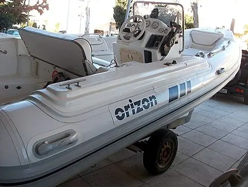 Rubbing strake replacement and tube cleaning on an Orizon inflatable boat, after