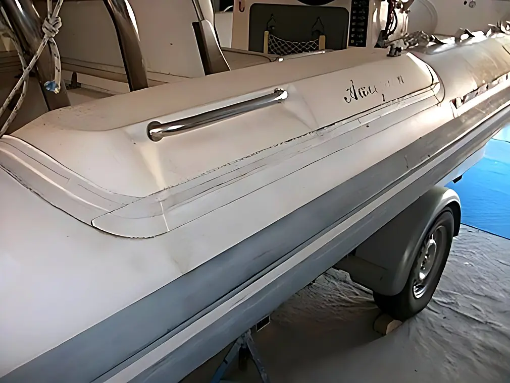 Bonding internal tapes on an Oceanic inflatable boat, before