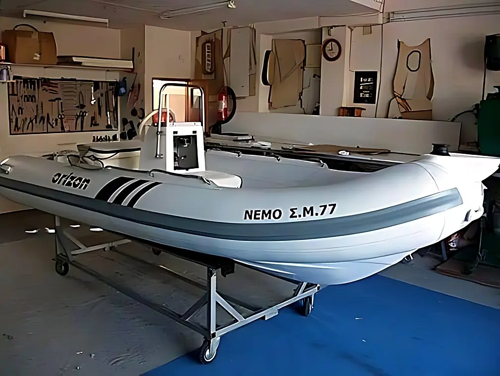 Full service and replacement of external sealing tapes on an Orizon inflatable boat, after