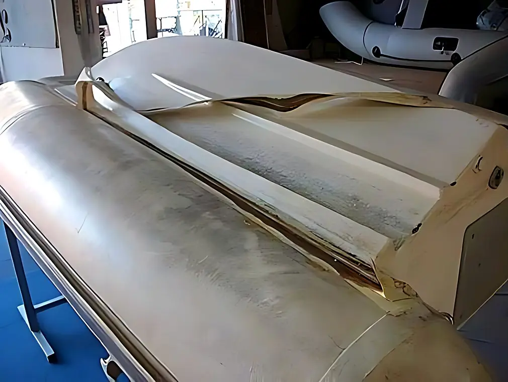 Bonding the external sealing tape on a PVC conventional inflatable, before