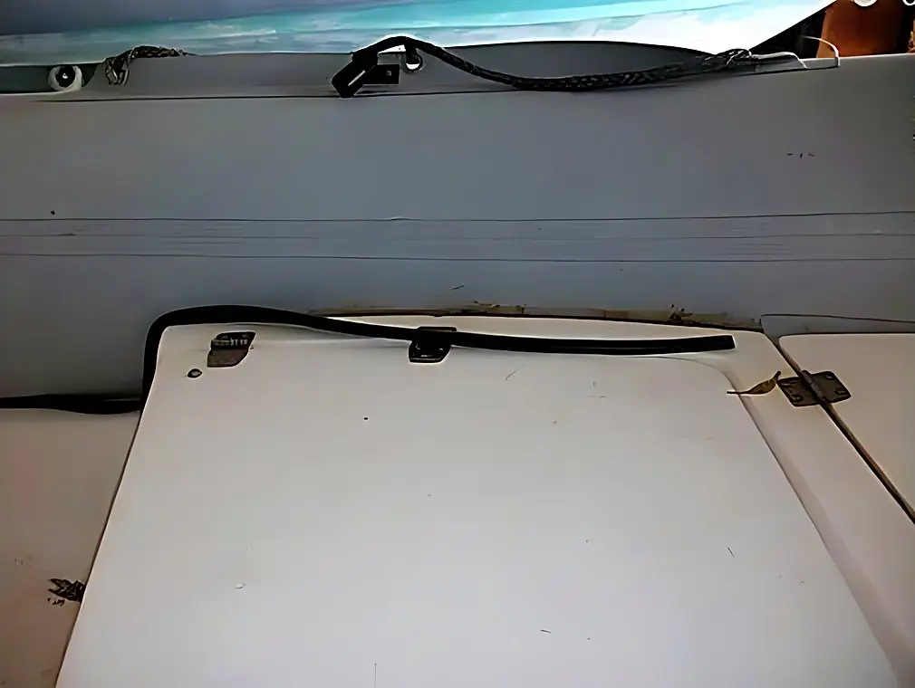 Bonding the internal sealing tape on an Orizon inflatable boat, before